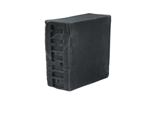 Black bar of soap called Dirt Face